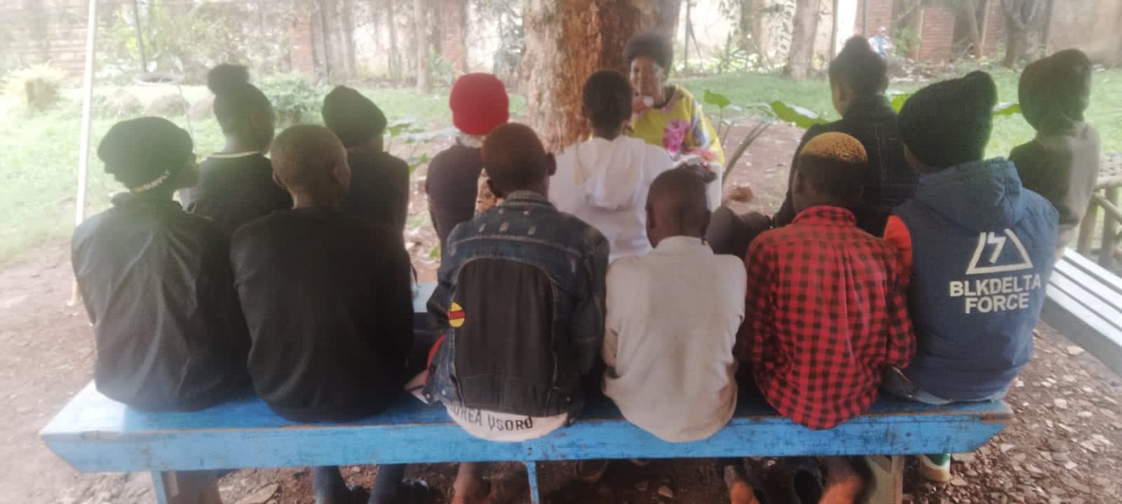 teacher Peris teaching children