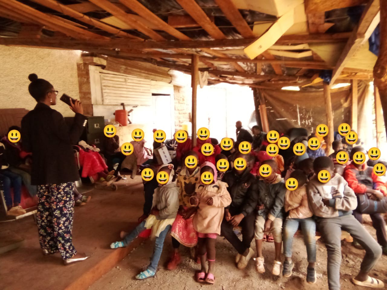 teacher Stella teaching children